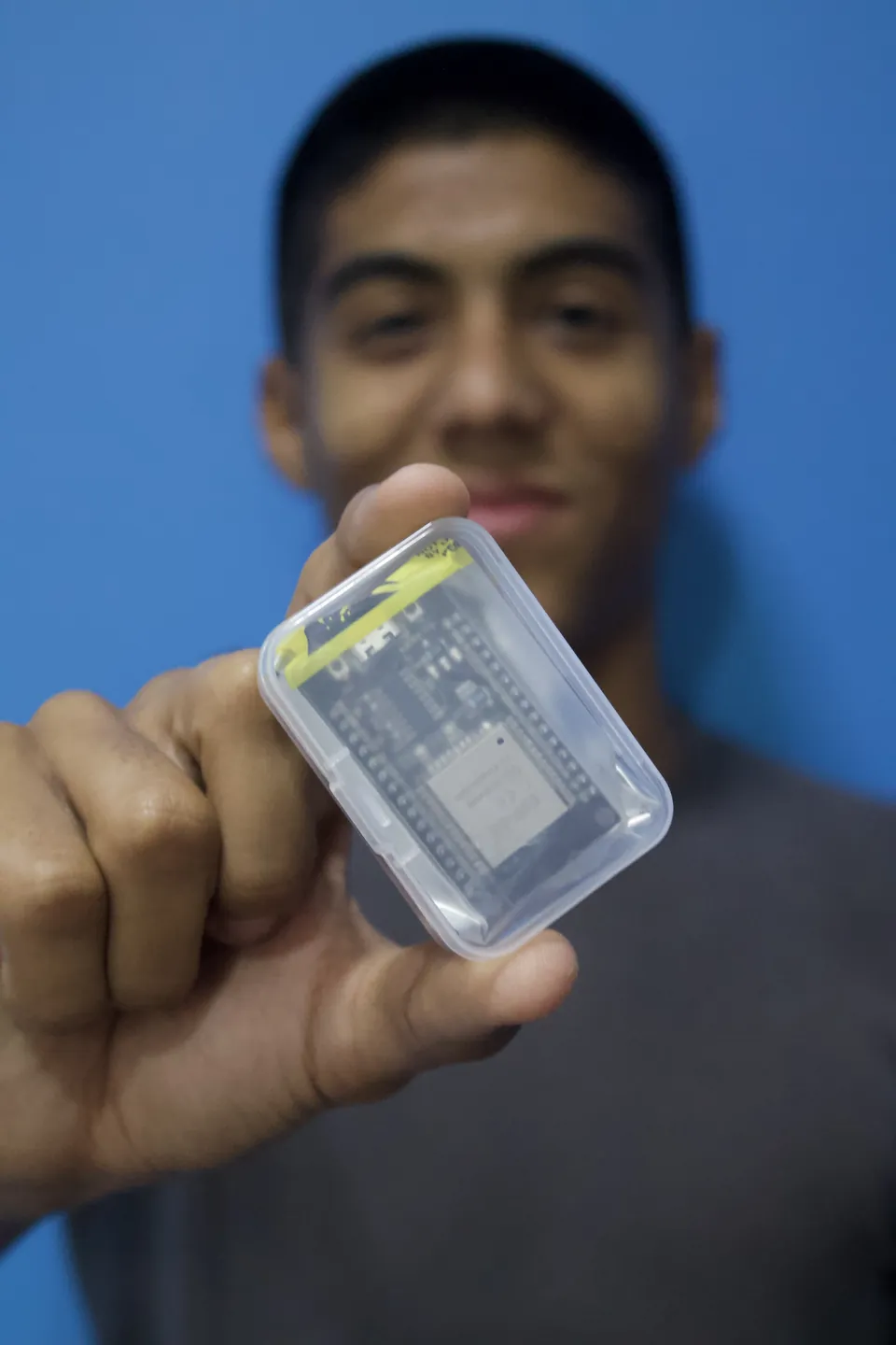 Joaquín Caballero showing a circuit he built